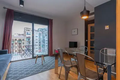 a balcony with a view of a city at The Collection Barcelona - Modern and bright apartment in Eixample 5-1 in Barcelona