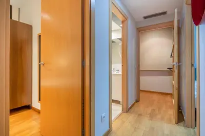 a living room with a couch and a table at The Collection Barcelona - 2 bedroom with balcony in Eixample 1-1 in Barcelona