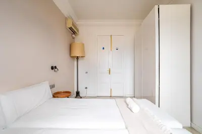 a room with a book shelf with books at The Collection Barcelona - Placa Catalunya Luminous and Exclusive 5Bd Penthouse in Barcelona