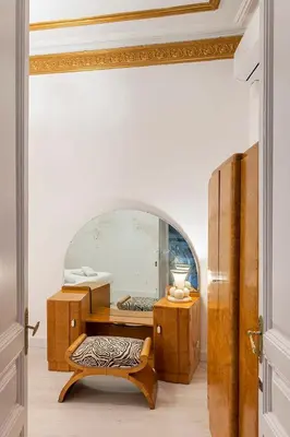 a bedroom with a bed with towels on it at The Collection Barcelona - Placa Catalunya V Charming and Exquisite 5Bd Apartment with Large Balcony in Barcelona