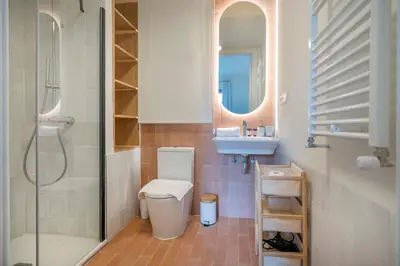 a bathroom with a toilet and a sink and a shower at The Collection Barcelona - Amazing 5 bd 5 bathroom next to Plaza Catalunya in Barcelona