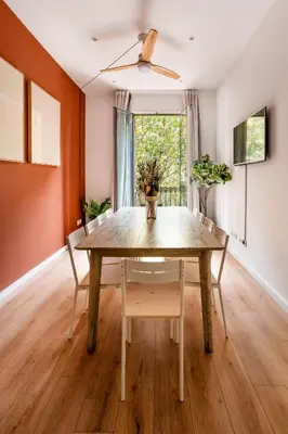 a dining room with a wooden table and chairs at The Collection Barcelona - Perfectly located 4bed 4bath apartment in Eixample in Barcelona