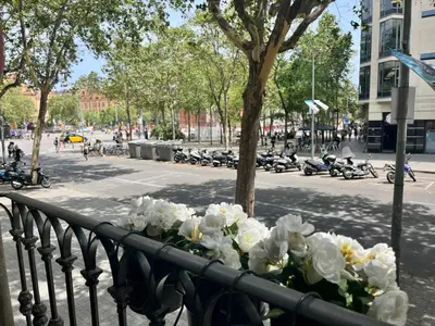 a bouquet of white flowers on a balcony at Front Arc in Barcelona