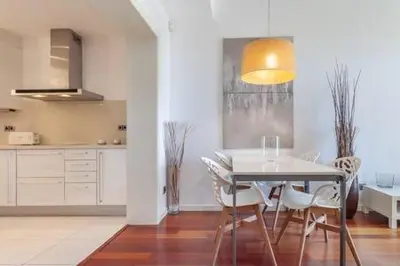 a living room with a couch and a table at The Collection Barcelona - Wonderful 2-bd apart with balcony Plaza Cataluña in Barcelona