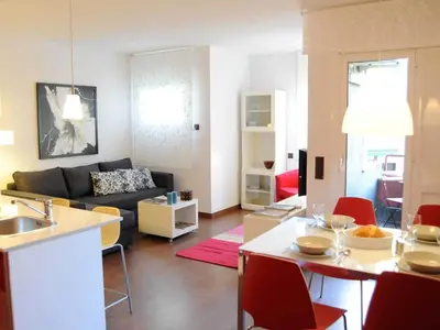 a living room with a couch and a table at Your Home in Barcelona Apartments in Barcelona