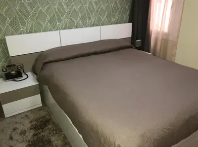a bed in a small room with a bed sidx sidx sidx at COMFORTABLE APARTMENT CLOSE TO BUNKERS DEL CARMEL! in Barcelona