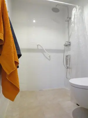 a bathroom with a shower and a toilet at 1900 B&B Terrassa in Terrassa