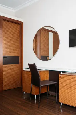 a room with a chair and a mirror at Hotel Astoria in Barcelona