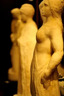 a group of statues of people on display at Hotel Derby in Barcelona