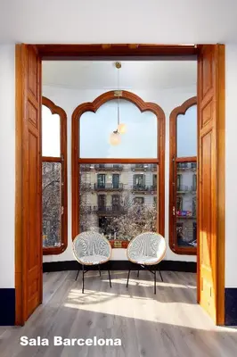 a hotel room with a large bed and a desk at HCC Regente in Barcelona