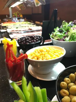 a buffet with different types of food on a table at Guitart Grand Passage in Barcelona