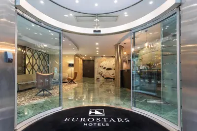 a store front of aluxury hotel lobby with glass windows at Eurostars Cristal Palace in Barcelona
