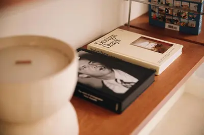 a book and a cup of coffee on a table at H La Paloma Boutique in Barcelona