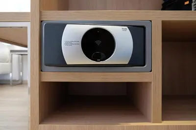 a small television sitting in a wooden cabinet at Caledonian in Barcelona