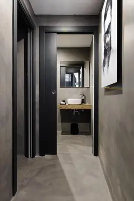a bathroom with a sink and a mirror at Elite Hotel - Gay Men Only in Sitges