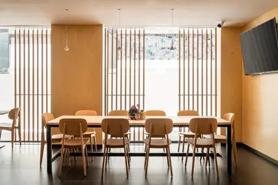 a dining room with a table and chairs at Ronda House in Barcelona