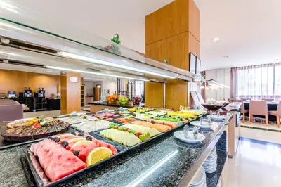 a buffet line with many different types of food at Exe Barbera Parc in Barbera del Valles