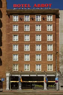 a hotel exterior with a large brick building at Hotel Abbot in Barcelona