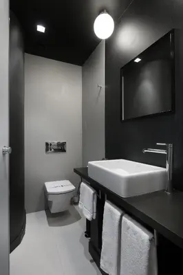 a bathroom with a sink and a toilet and a mirror at Wilson Boutique Hotel in Barcelona