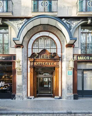 a building with an entrance to a hotel at Oriente Atiram Hotel in Barcelona