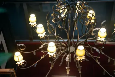 a chandelier with many lights in a room at Hotel Ramblas Internacional in Barcelona