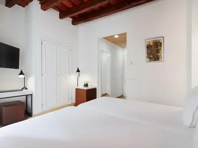 a bathroom with two sinks and a shower at H10 Raco del Pi in Barcelona