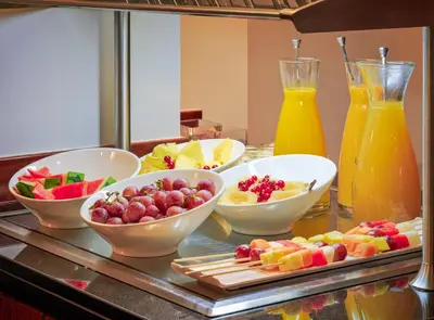 a buffet line with many different types of food at H10 Raco del Pi in Barcelona