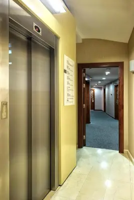 an elevator in an office building with a hallway at ITC Barcelona By Soho Boutique in Barcelona