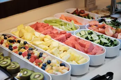a buffet of different types of fruits and vegetables at Catalonia Sagrada Familia in Barcelona
