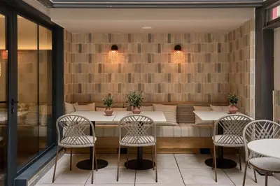 a dining room with a table and chairs at Catalonia Mikado in Barcelona