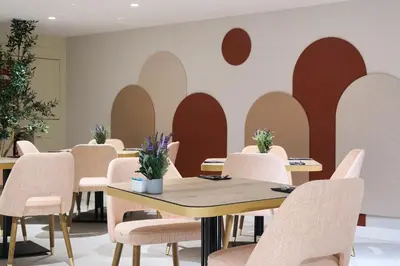 a bedroom with a bed and a chair and a table at Catalonia Barcelona 505 in Barcelona