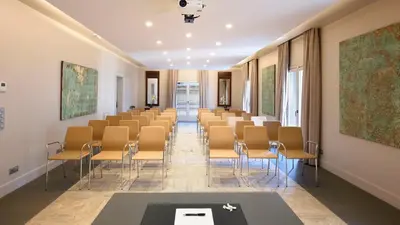 a conference room with chairs and a table in it at Duquesa de Cardona Hotel 4 Sup by Grup Duquessa in Barcelona