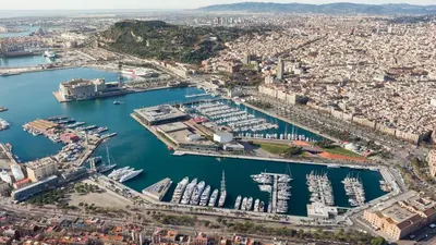an aerial view of a harbor with boats at SPACIOUS YACHT HOTEL BARCELONA CITY CENTER 5 CABINs in Barcelona