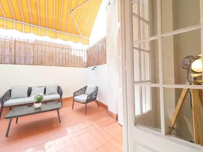 a living room with two chairs and a couch at BarcelonaForRent The Living Terrace in Barcelona