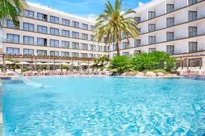 a large swimming pool in front of a hotel at Sumus Hotel Stella and Spa 4S Adults Recommended in Pineda de Mar