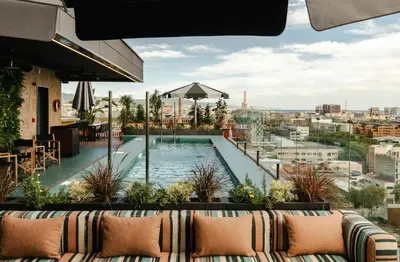 a swimming pool on the roof of a building at The Social Hub Barcelona Poblenou in Barcelona