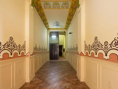 a hallway in a building with a ceiling at Casa Cosi Patio 1 in Barcelona