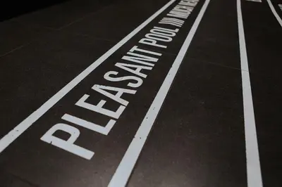 a sign on a tennis court with the word tennis on it at TOC Hostel Barcelona in Barcelona