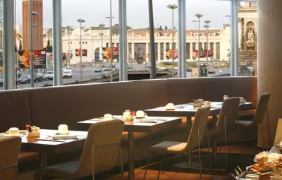 a large white counter in a room with a wall at B Hotel in Barcelona