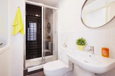a bathroom with a toilet and a sink and a shower at Free Hostels Barcelona in Barcelona