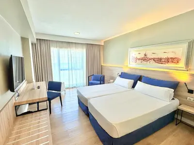 a hotel room with a bed and a television at Eurohotel Barcelona Granvia Fira in Hospitalet de Llobregat