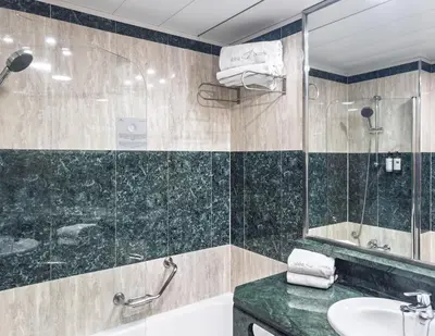 a bathroom with a sink and a shower at Abba Rambla Hotel in Barcelona