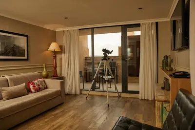 a living room with a camera and a couch at El Avenida Palace in Barcelona