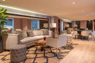 a living room with a couch and a table at Hesperia Barcelona Barri Gòtic in Barcelona