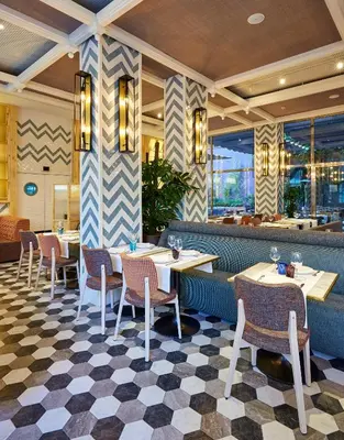 a dining room with tables and chairs in a restaurant at Hotel Barcelona Catedral 4 Sup in Barcelona