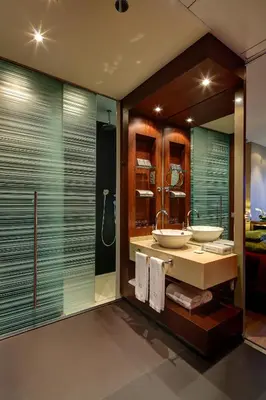 a bathroom with two sinks and a shower at Olivia Plaza Hotel in Barcelona