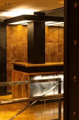 an empty room with a table and a bench at Hotel Granados 83, a member of Preferred Hotels & Resorts in Barcelona