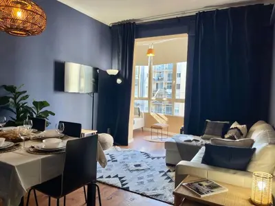 a living room with a couch and a table at The Collection Barcelona - Sagrada Familia 4BD only for Families or Business groups in Barcelona