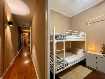 a room with a bunk bed and a hallway at The Collection Barcelona - Sagrada Familia 4BD only for Families or Business groups in Barcelona
