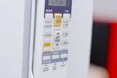 a close up of a television remote control at Barcelona City Centre Hostal in Barcelona